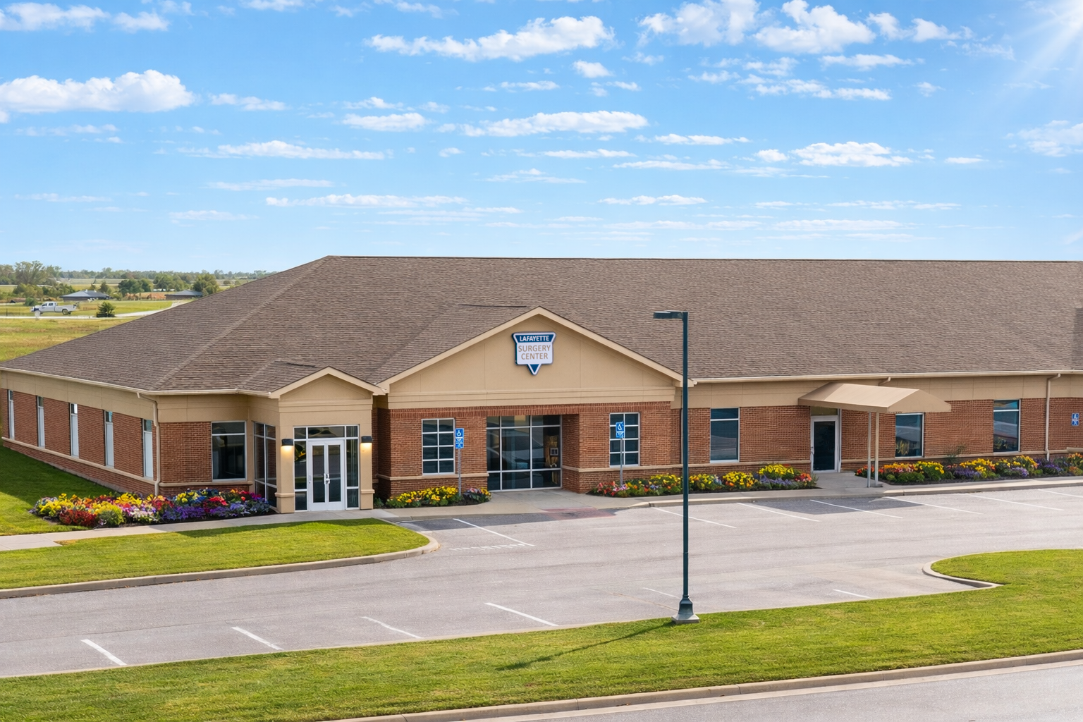 Lafayette Surgery Center - Lafayette Logo